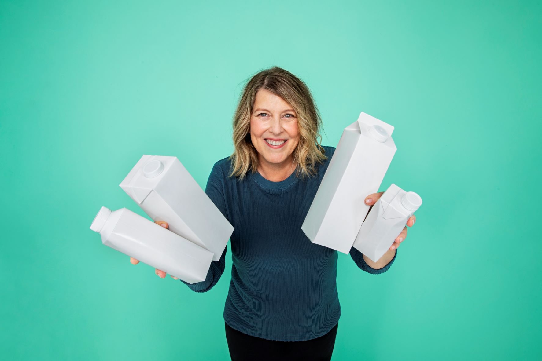 Woman with cartons for container materials
